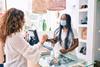 Happy-store-worker-in-mask